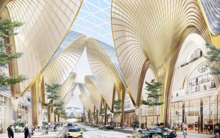 Emaar's render of Dubai Square: a street of shops under tall gold and glass canopies